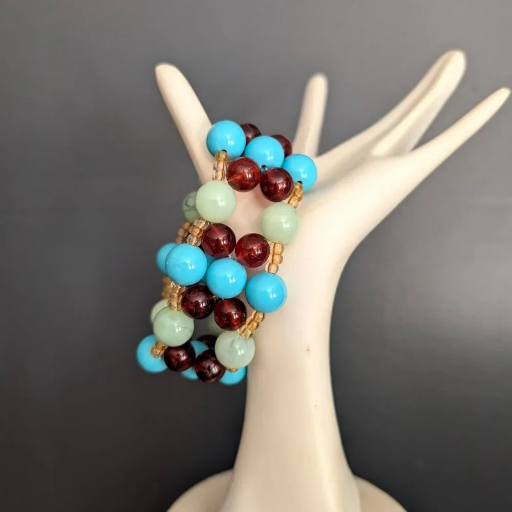 Blue, amber, green and pale yellow beaded stretch bracelet